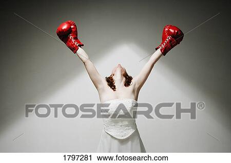 Stock Image - Bride fights back. Fotosearch