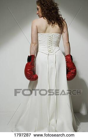 Stock Photo - Bride with boxing gloves. Fotosearch