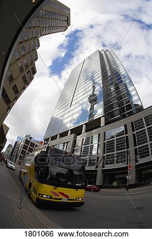 Stock Photograph - Bus on a downtown street. Fotosearch