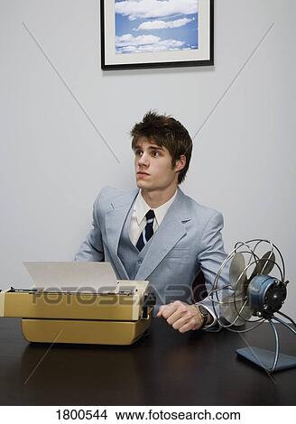 Businessman with old technology View Large Photo Image Picture - Businessman with old technology. Fotosearch