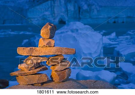 Cairn in front of glacier, ice cave and mountain View Large Photo Image Stock Image - Cairn in front of glacier, ice cave and mountain . Fotosearch