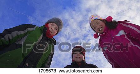 Children wearing winter clothing View Large Photo Image Stock Photo - Children wearing winter clothing. Fotosearch