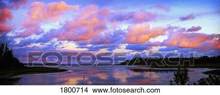 Colorful sky over water View Large Photo Image Picture - Colorful sky over water. Fotosearch