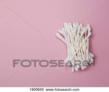 Stock Image - Cotton Swabs On Pink Surface. Fotosearch
