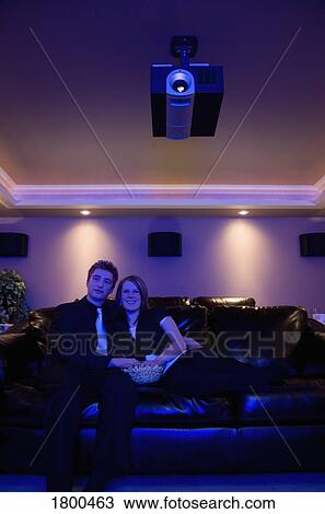 Couple watching a movie View Large Photo Image Stock Image - Couple watching a movie. Fotosearch