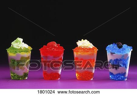 Picture - Four cups of jelly. Fotosearch