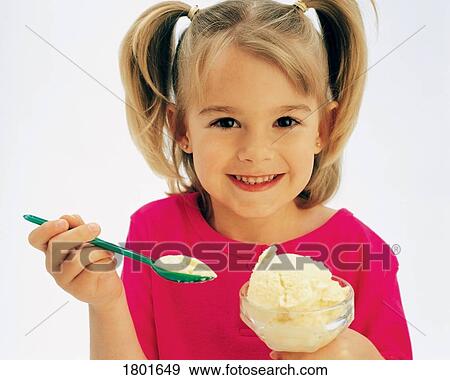 Girl eating ice cream View Large Photo Image Stock Photo - Girl eating ice cream. Fotosearch