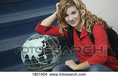 Girl sitting on stairs View Large Photo Image Picture - Girl sitting on stairs . Fotosearch