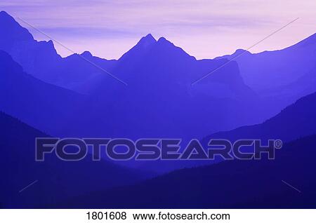 Hazy layered mountain scene View Large Photo Image Stock Photo - Hazy layered mountain scene . Fotosearch