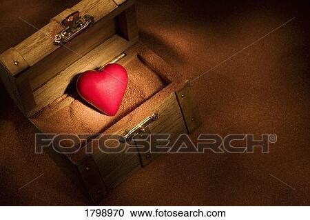 Stock Image - Heart in a wooden box. Fotosearch