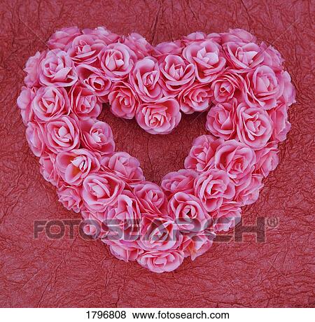 Stock Photo - Heart-shaped floral arrangement. Fotosearch