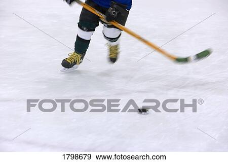 Stock Photo - Hockey player. Fotosearch