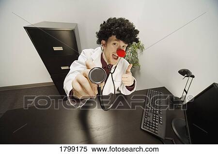 Stock Photography - Humourous male doctor. Fotosearch