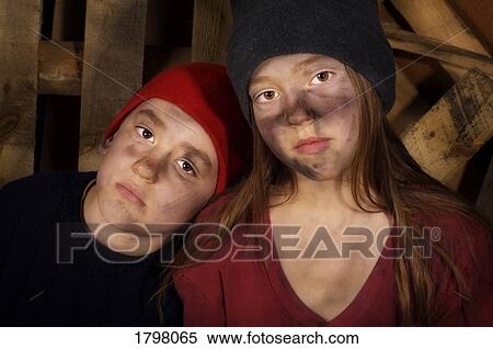 Stock Photography - Impoverished boy and girl. Fotosearch