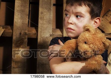 Impoverished boy View Large Photo Image Stock Photo - Impoverished boy. Fotosearch