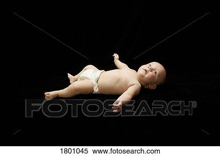 Infant laying down View Large Photo Image Stock Photography - Infant laying down. Fotosearch