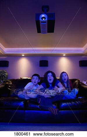 Kids watching movie View Large Photo Image Stock Image - Kids watching movie. Fotosearch