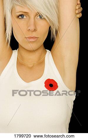 Stock Image - Lady with poppy. Fotosearch