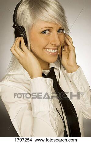 Picture - Listening to music. Fotosearch