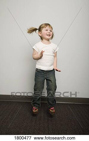 Stock Photo - Little girl dancing. Fotosearch