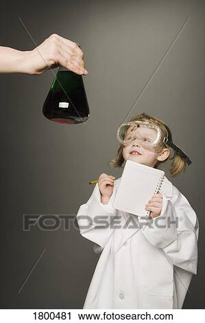 Stock Image - Little girl dressed as a scientist. Fotosearch