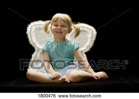 Stock Photograph - Little girl with wings. Fotosearch