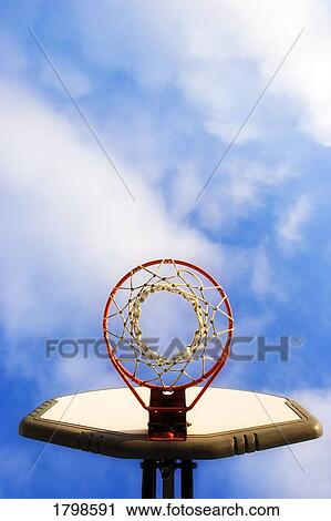 Low angle view of a basketball hoop View Large Photo Image Stock Image - Low angle view of a basketball hoop. Fotosearch