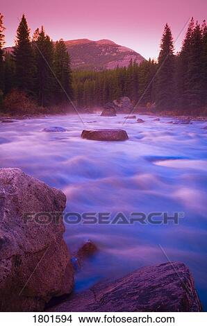 Picture - Maligne River through the Rocky Mountains . Fotosearch