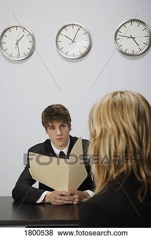 Man and woman in workplace View Large Photo Image Stock Photo - Man and woman in workplace. Fotosearch