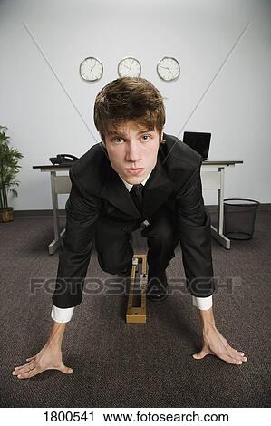 Stock Image - Man In Office Ready To Run. Fotosearch