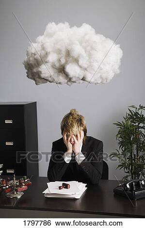 Stock Photograph - Man unhappy at work. Fotosearch