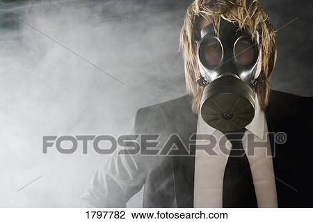 Man wearing a gas mask View Large Photo Image Stock Image - Man wearing a gas mask. Fotosearch