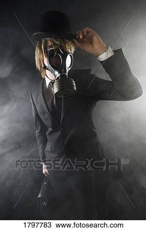 Man wearing a gas mask View Large Photo Image Stock Image - Man wearing a gas mask. Fotosearch