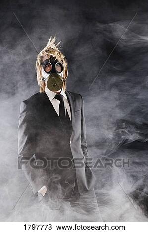 Man wearing a gas mask View Large Photo Image Stock Photo - Man wearing a gas mask. Fotosearch