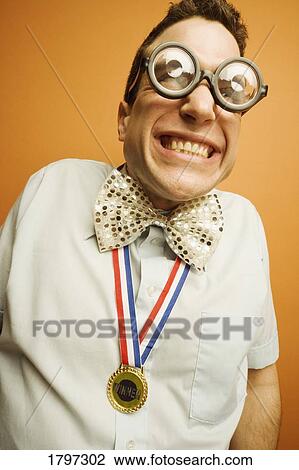 Stock Image - Man wearing a medal. Fotosearch