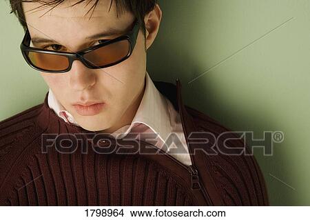 Man wearing sunglasses View Large Photo Image Picture - Man wearing sunglasses. Fotosearch