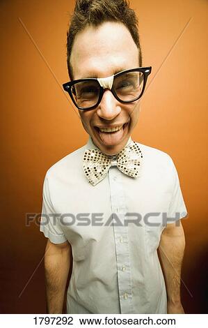 Man wearing taped glasses and a bow tie View Large Photo Image Stock Image - Man wearing taped glasses and a bow tie. Fotosearch