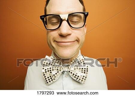 Man wearing taped glasses and a bow tie View Large Photo Image Stock Image - Man wearing taped glasses and a bow tie. Fotosearch