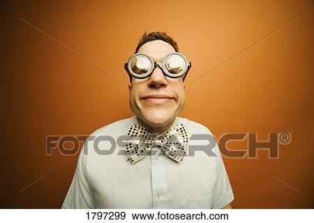 Man wearing thick glasses and a bow tie View Large Photo Image Stock Photo - Man wearing thick glasses and a bow tie. Fotosearch