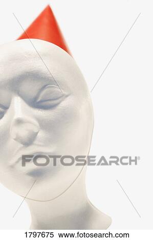 Stock Photography - Mannequin wearing a party hat. Fotosearch