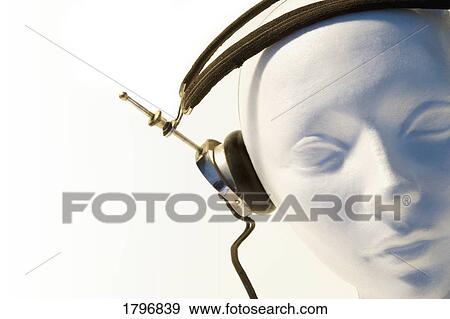 Stock Photo - Mannequin wearing headphones. Fotosearch