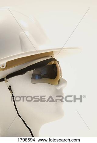 Picture - Mannequin wearing safety glasses and helmet. Fotosearch