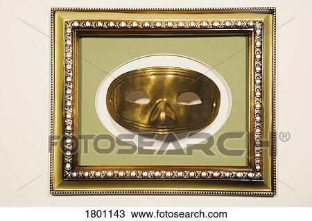 Mask in a picture frame View Large Photo Image Stock Image - Mask in a picture frame. Fotosearch