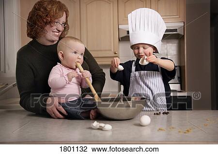 Mother baking with children View Large Photo Image Stock Image - Mother baking with children . Fotosearch