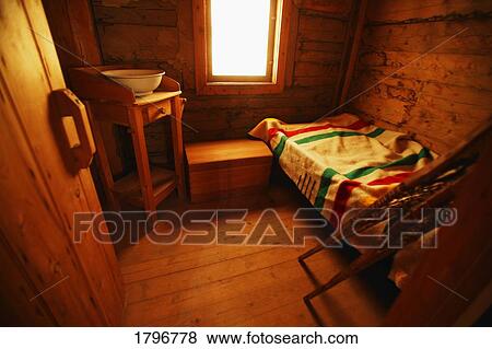 Old-fashioned room with Hudson's Bay Company blanket, snowshoes and washing basin View Large Photo Image Stock Photo - Old-fashioned room with Hudson's Bay Company blanket, snowshoes and washing basin. Fotosearch