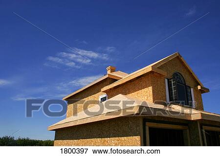 Stock Photo - Partially constructed house. Fotosearch