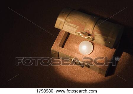Pearl in a wooden box View Large Photo Image Stock Image - Pearl in a wooden box. Fotosearch