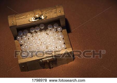 Stock Photo - Pearls in a wooden box. Fotosearch