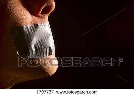Person with tape over their mouth View Large Photo Image Stock Photo - Person with tape over their mouth. Fotosearch