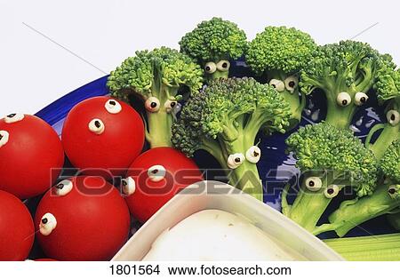 Picture - Personified cherry tomatoes and broccoli. Fotosearch